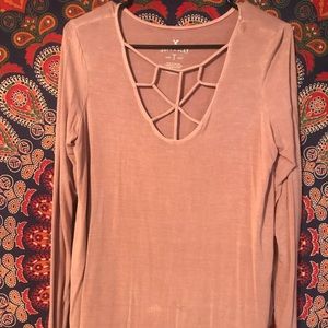 Long sleeve tunic with details on the chest
